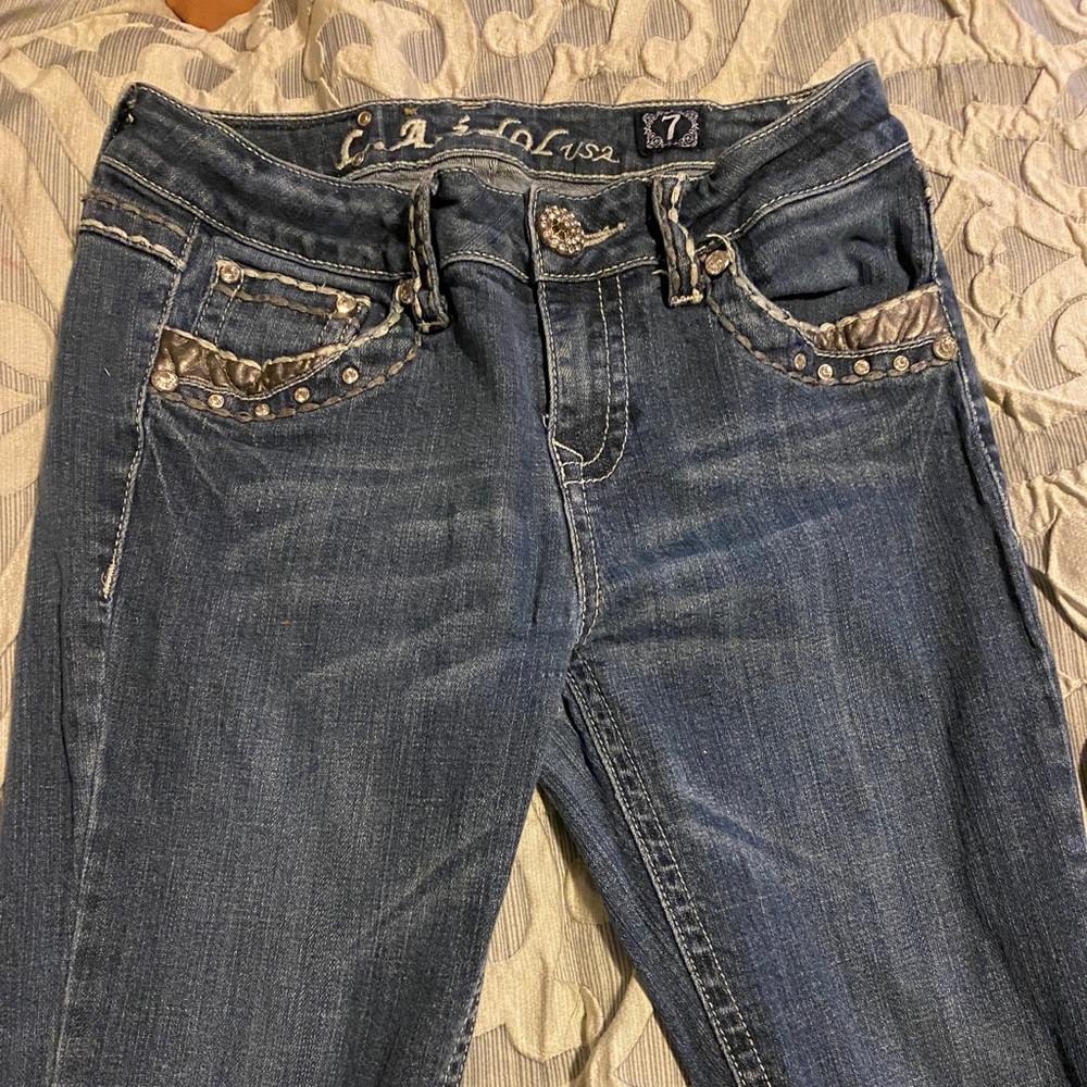 L.A. Idol Jeans Size 7 in good condition. Missing a few diamond studs.